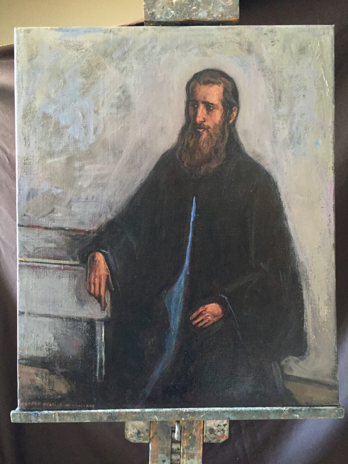 Seated man in a blue shirt, painting by Lambro Ahlas