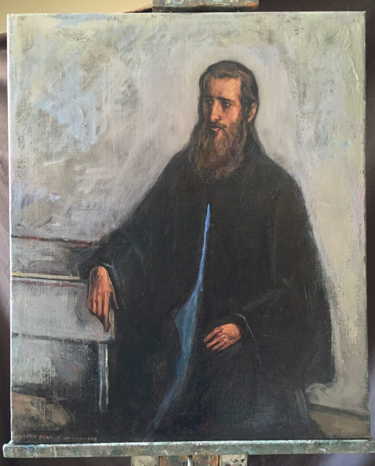 Seated man in a blue shirt, painting by Lambro Ahlas