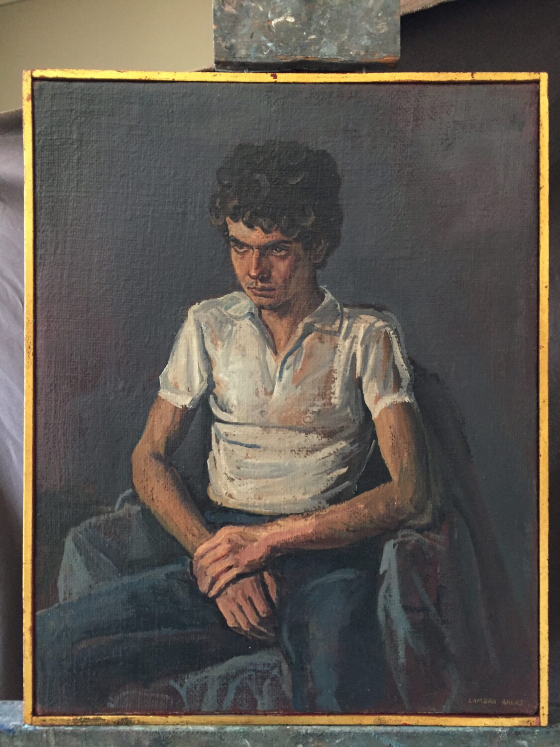 Seated young man, painting by Lambro Ahlas